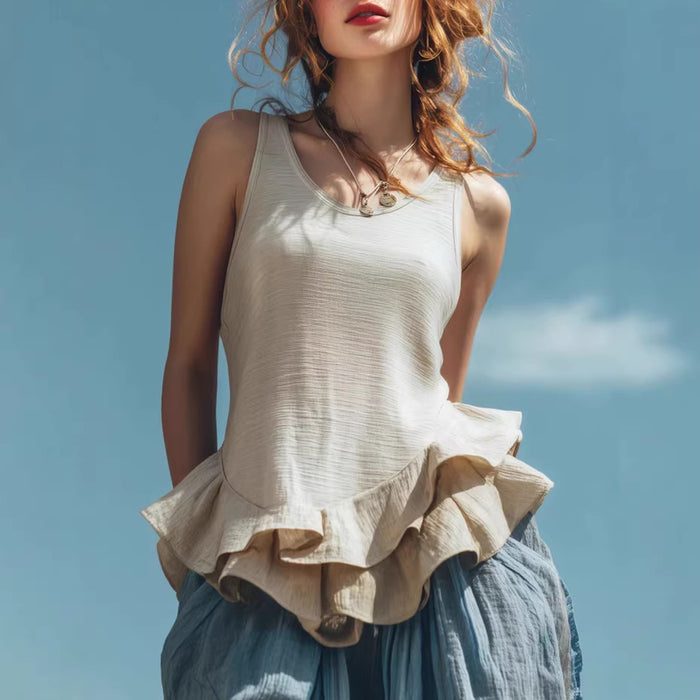Casual sleeveless top with feminine layered finish and breathable styling