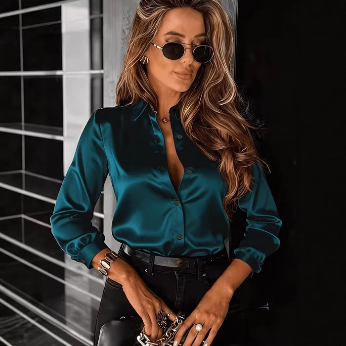 Drapey satin blouse styled with slim belt and structured pants