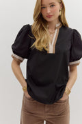 Women's black puff sleeve top with tan and cream trim by Entro