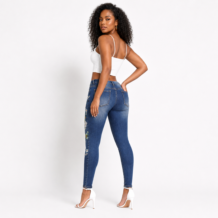 Streetwear blue skinny jeans with floral embroidery, slim fit pencil pants shape, high waist cut, and soft cotton denim style