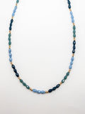 Skylar Beaded Necklace. Blue beads with gold accents.