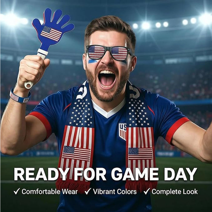 Man in sports jersey and sunglasses with American flag accessories, cheering in a stadium.
