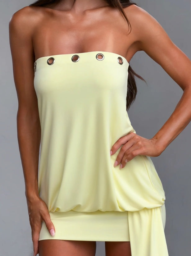 Layered yellow party dress paired with heels for club night style