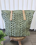 Woven straw tote bag.