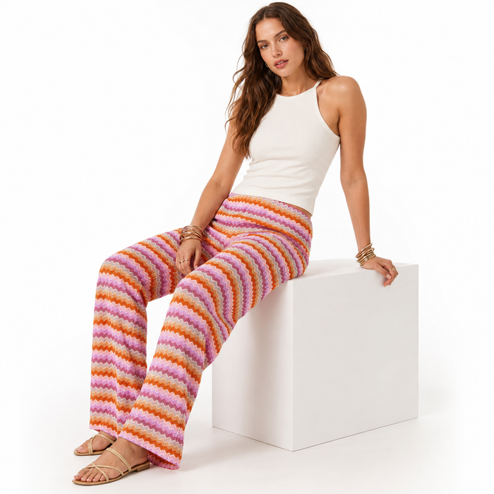 Statement wide leg pants for women featuring vivid contrasting colors, patterned panels and a full-length relaxed silhouette.