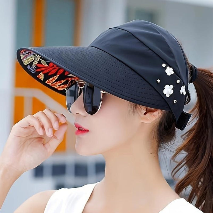 Ponytail-friendly sun hat for women with clean beige finish, wide brim shade, and feminine floral accent for summer for sun c