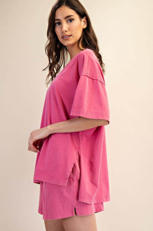 Women's oversized top in mineral washed french pink by Rae Mode showing full side view