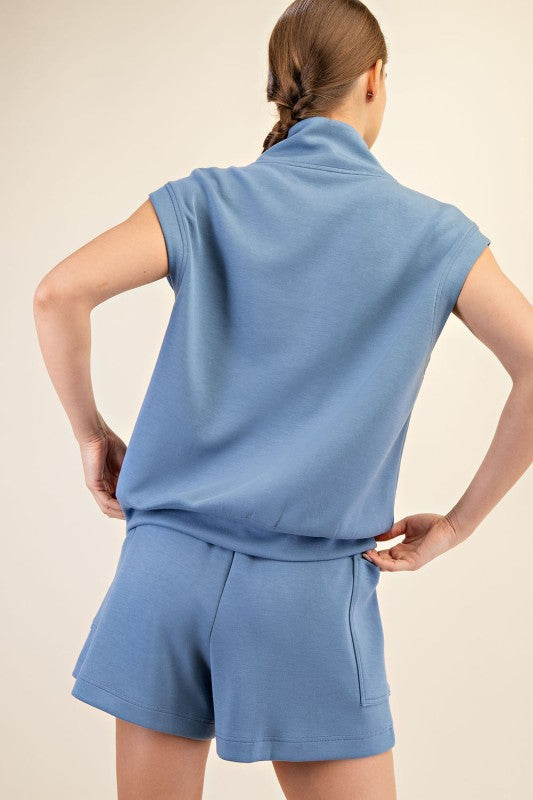 Women's paradise blue scuba knit sleeveless top showing back view