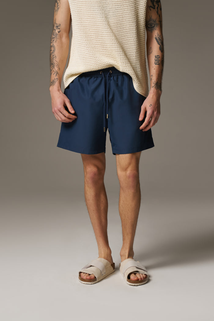 WATER REACTIVE EMBLEM SWIM SHORT - NAVY