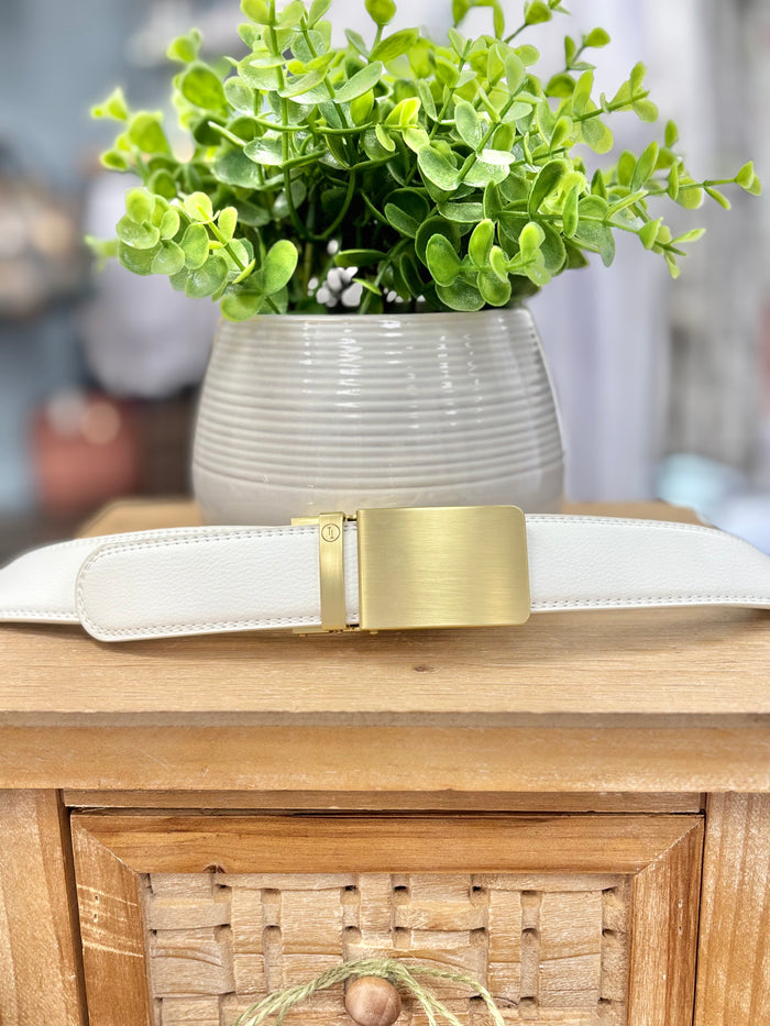 White leather belt with gold buckle.