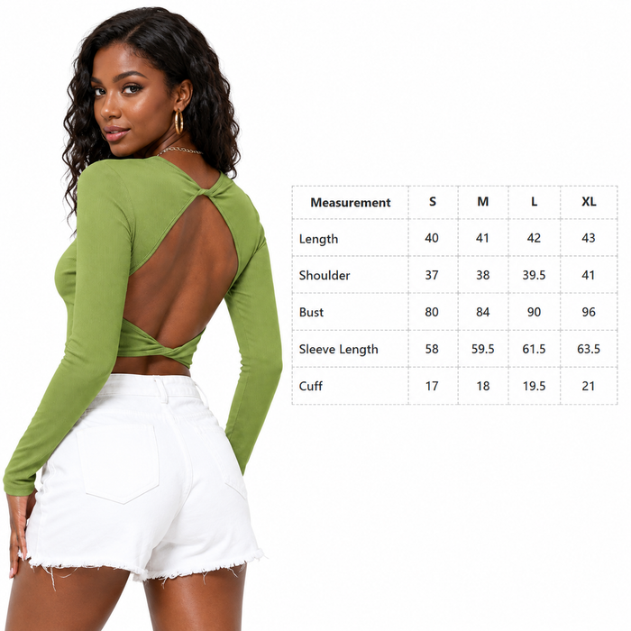 Women's green cropped long sleeve top with size chart in centimeters for S, M, L and XL on a clean white background.