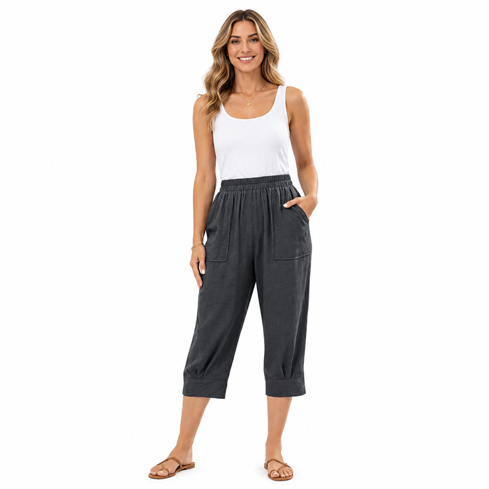 Women's casual pants with crop length, elastic waist, large pockets, and slight stretch in a polished relaxed-fit silhouette.