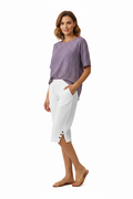 Women's linen drawstring shorts in a relaxed cropped fit with practical side pockets and adjustable waist for summer outfits.