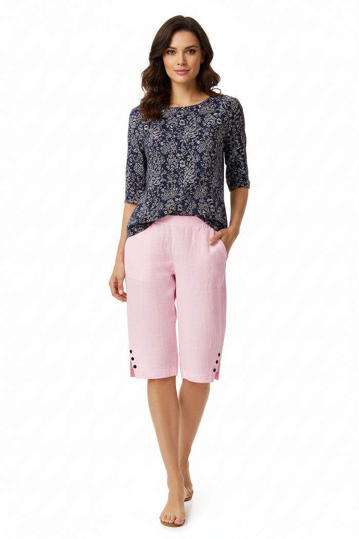 Front view of women's linen shorts showing the adjustable drawstring waist, loose leg shape and practical side pocket details