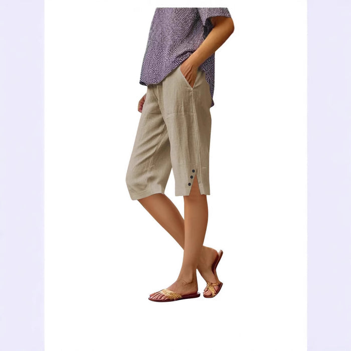 Women's loose fit linen shorts sky blue, pockets open detail, elastic waistband, flowy drape, styled with sandals outdoor setting