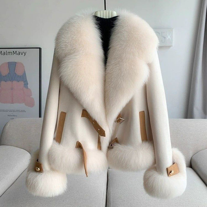 elegant winter outerwear apricot coat worn open with tailored trousers