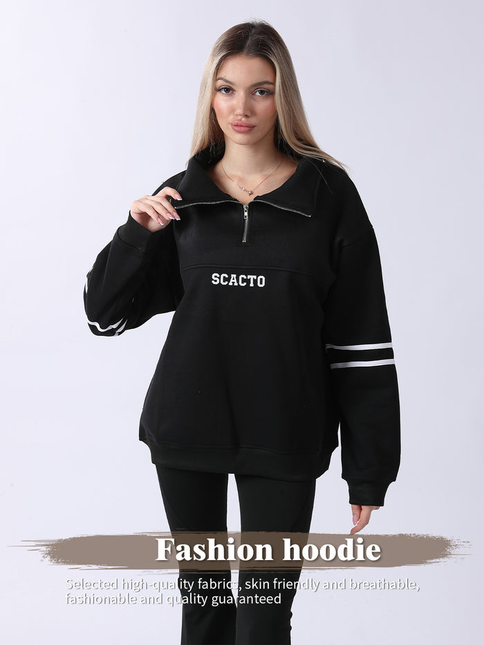 Woman wearing a black hoodie with 'SCACIO' branding on a white background