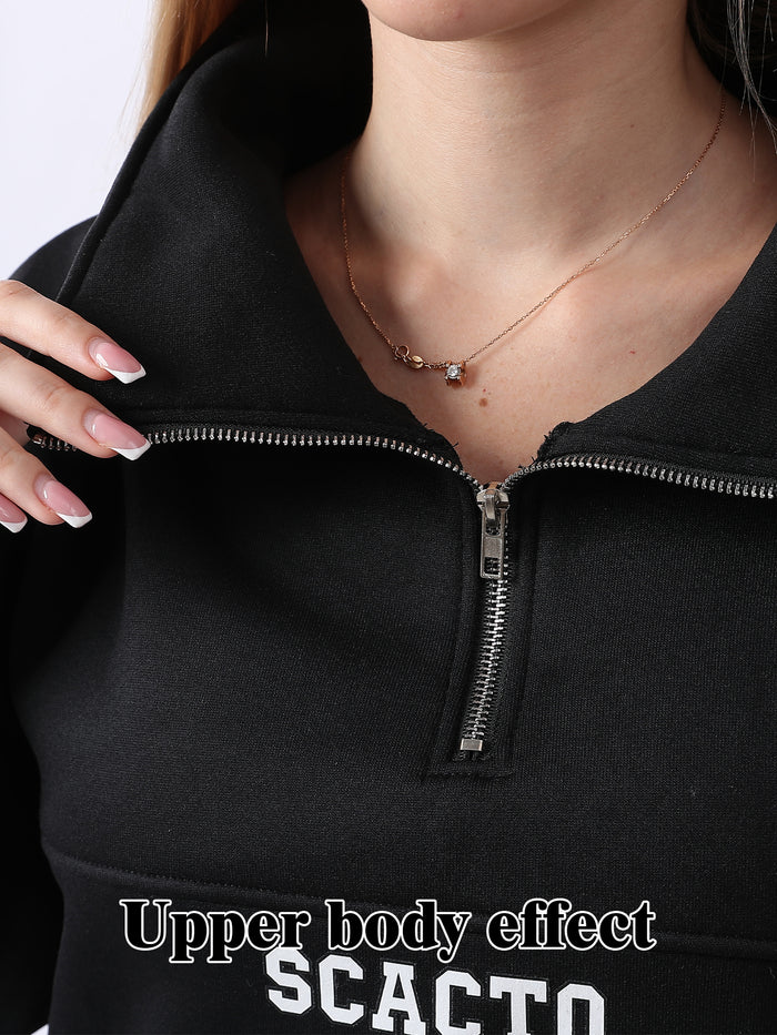 Close-up of a person wearing a black zip-up hoodie with 'SCACO' branding.