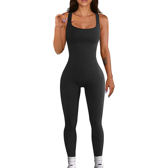 Detail shot of long sleeves and slim torso fit on a casual athleisure one-piece.