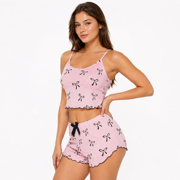 Women's pajama set shorts with ribbed texture, bow pattern, tank top and matching bottoms for comfortable home styling today.