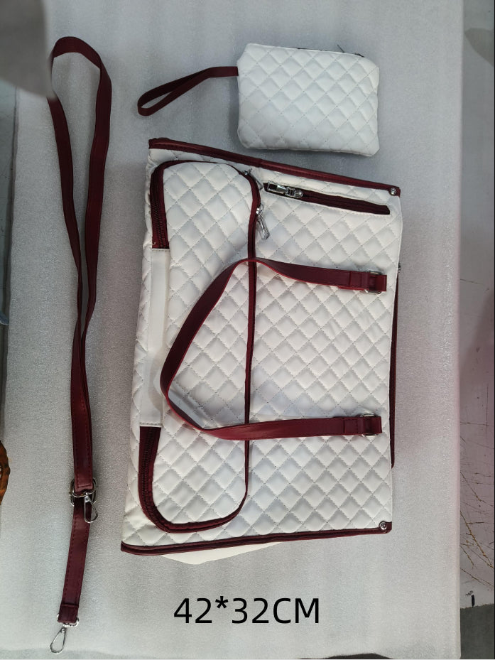 Women's lunch tote bag showing a zipper pocket, phone pocket, file section, laptop area and thermal divider for organized use