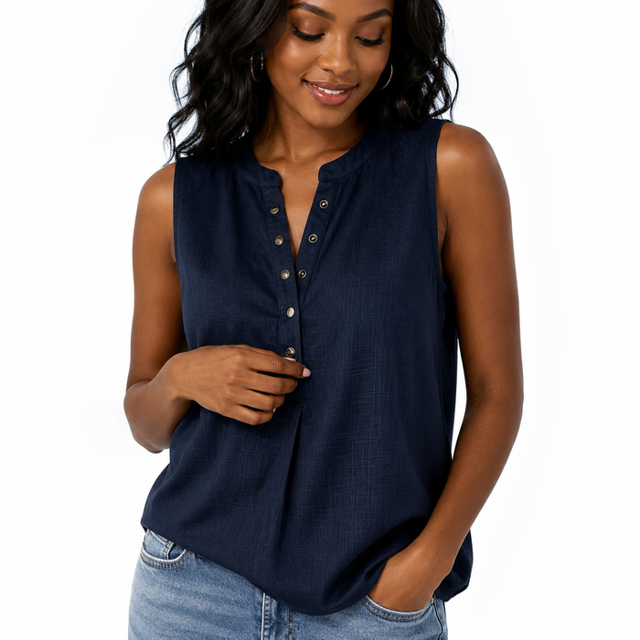 Loose fit women's sleeveless top with decorative buttons, curved hem and minimalist workwear style for daily wear.