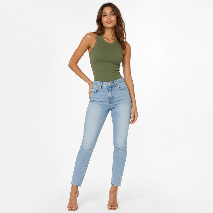 Olive ribbed vest with refined texture, flattering fit, and clean denim styling