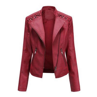 Women's short PU moto jacket with lapel collar and slim styling, presented for casual outfits and transitional city layering.