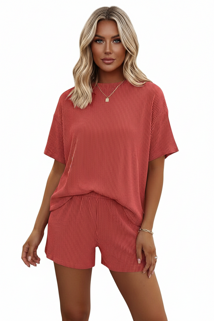 Front-view of model wearing grey women's striped casual set, casual daytime look