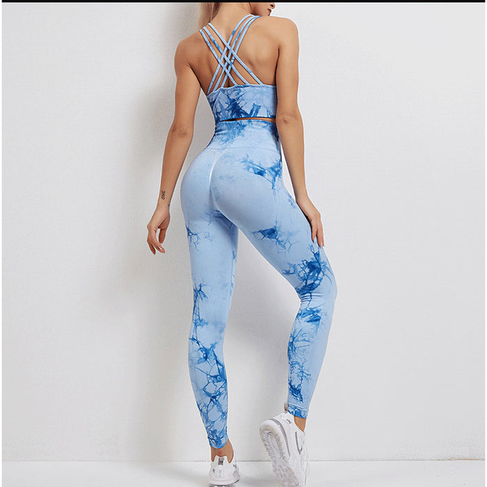 Sleeveless yoga outfit for women with tie-dye design and full-length trousers for gym sessions and relaxed activewear day fit
